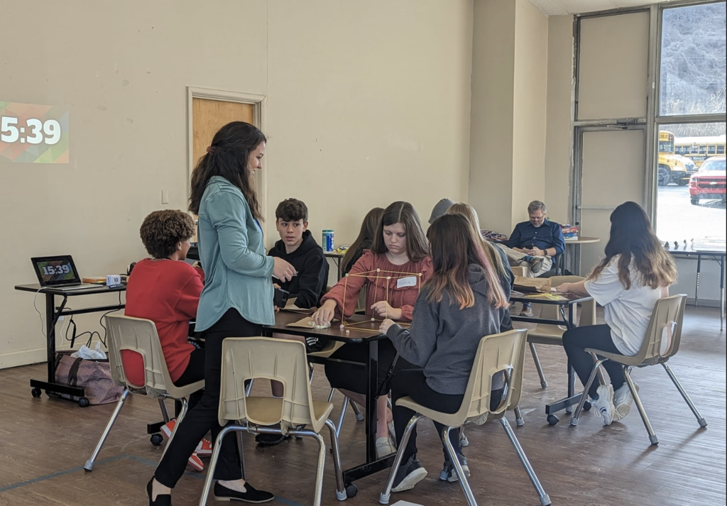 Rachel Grider works with students